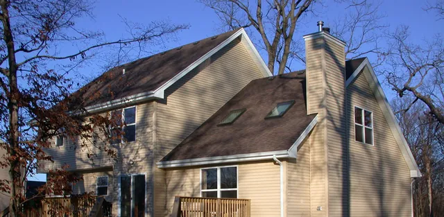 DFC Roofing crew on a roof replacement in Elgin, IL